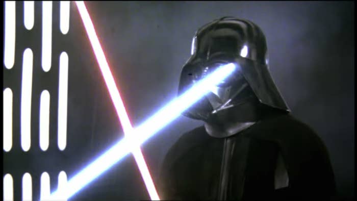 Darth Vader fighting with lightsaber