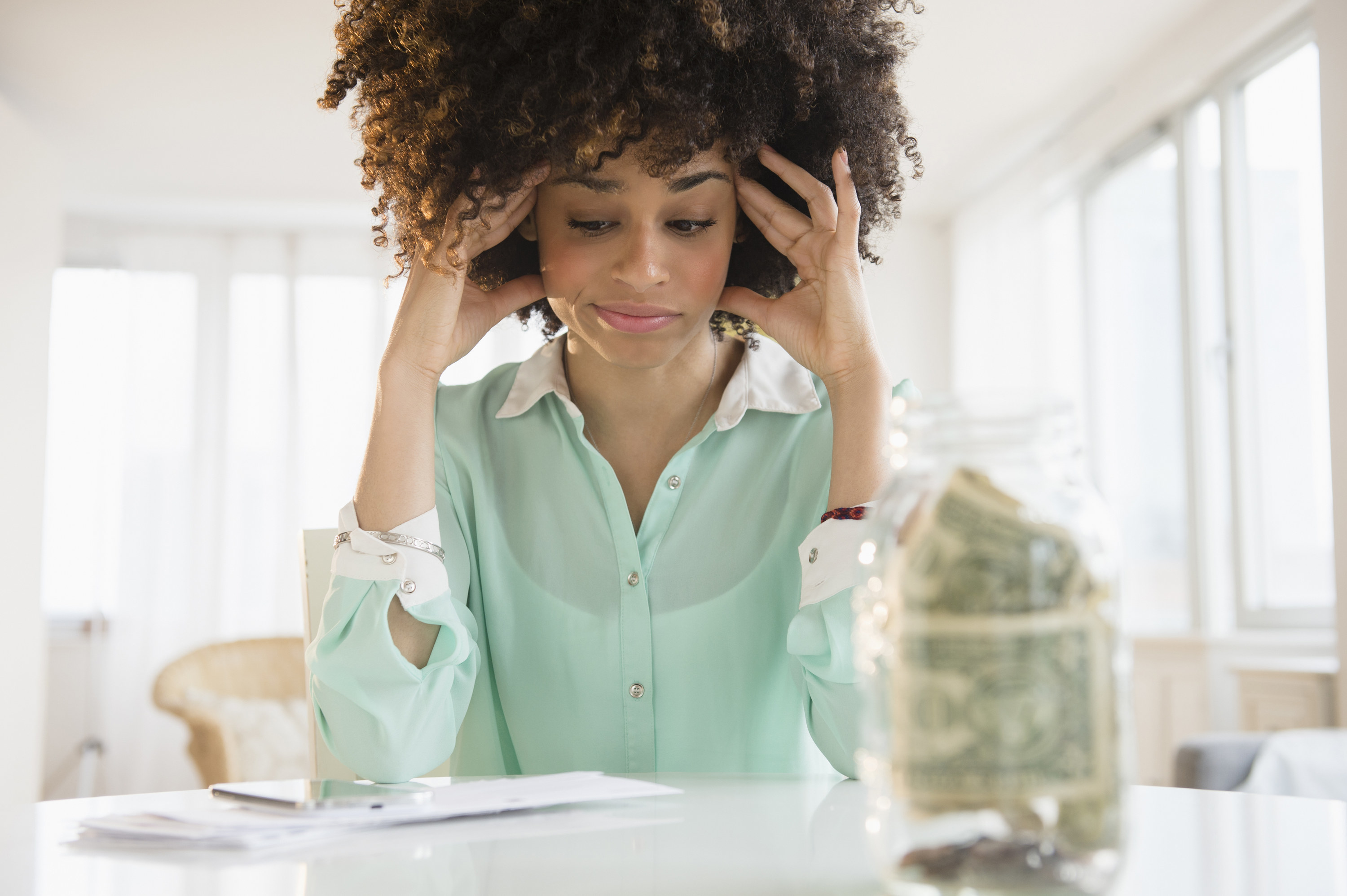 woman feeling stressed about money