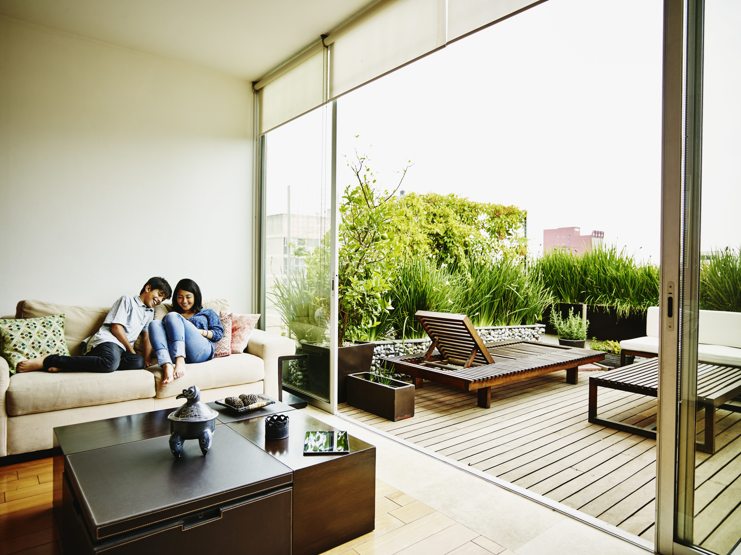 Couple sitting on the couch in a nice apartment