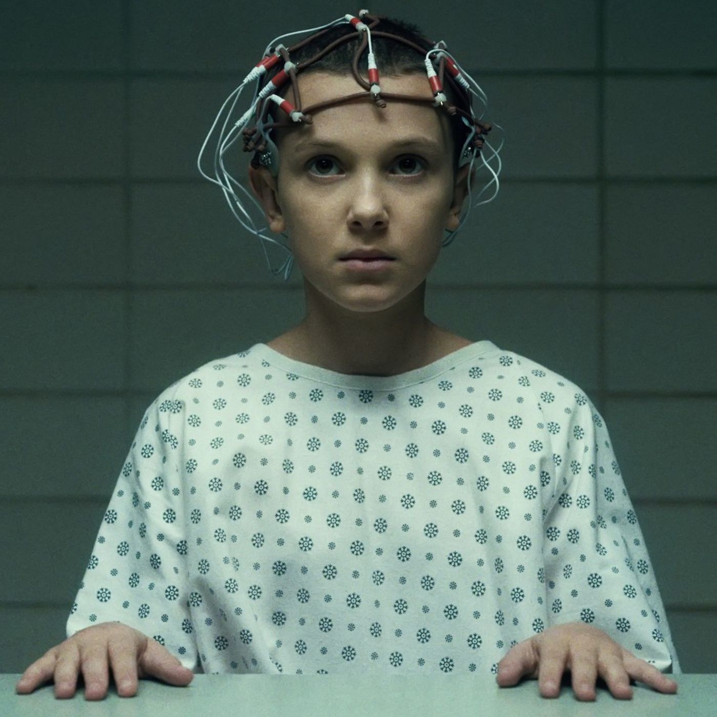 millie bobbie brown as eleven wears lab headgear in &quot;stranger things&quot;