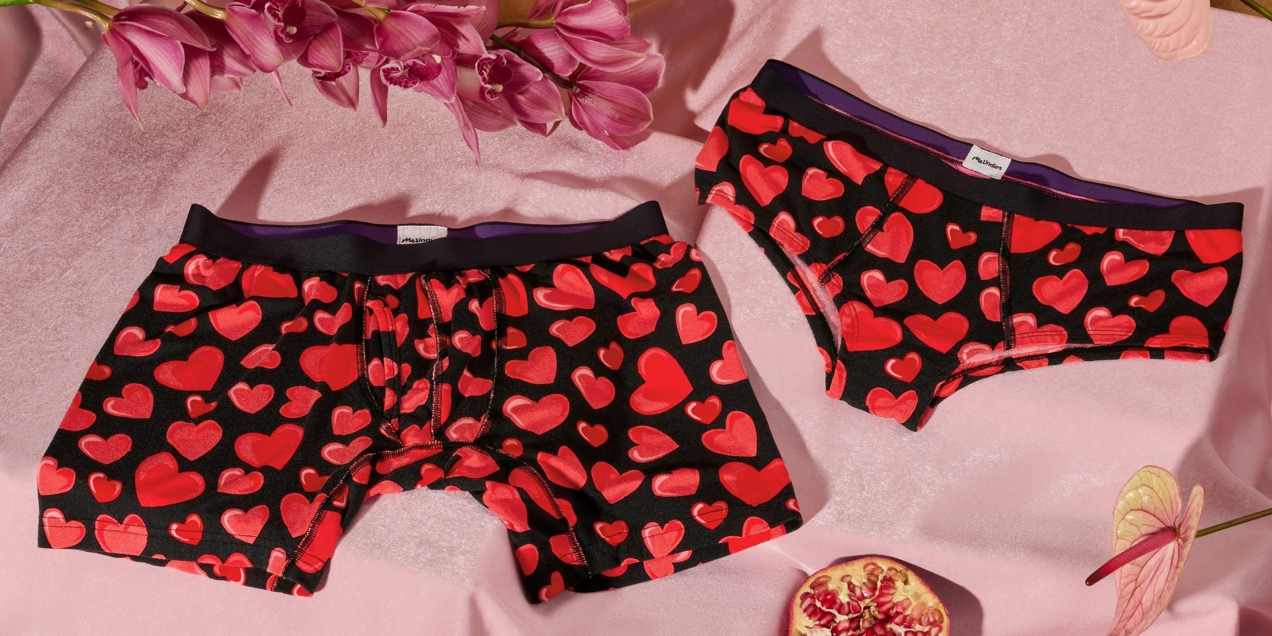 a pair of boxer briefs and bikini cut underwear with matching heart-shaped prints