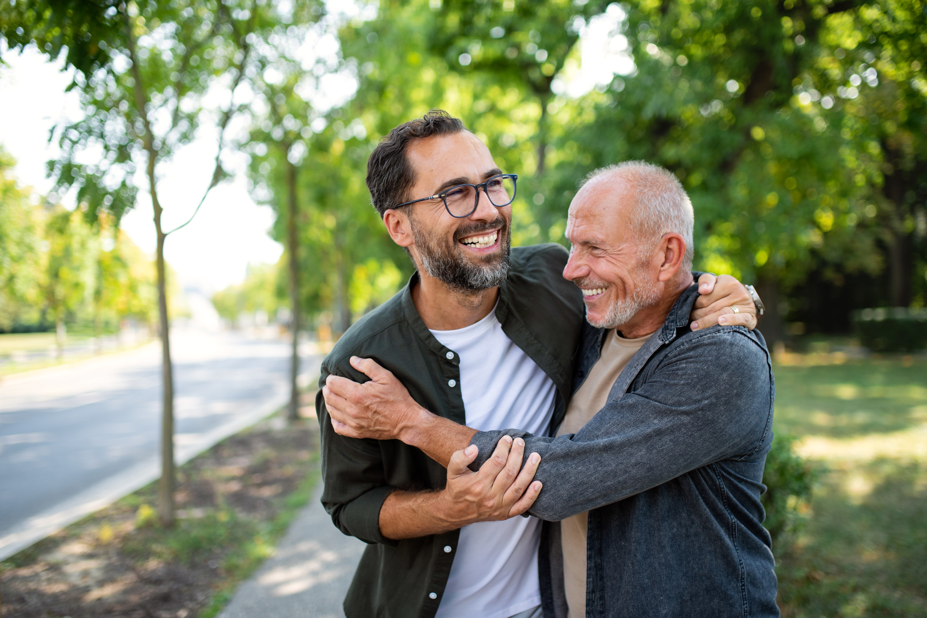 two men hugging each other