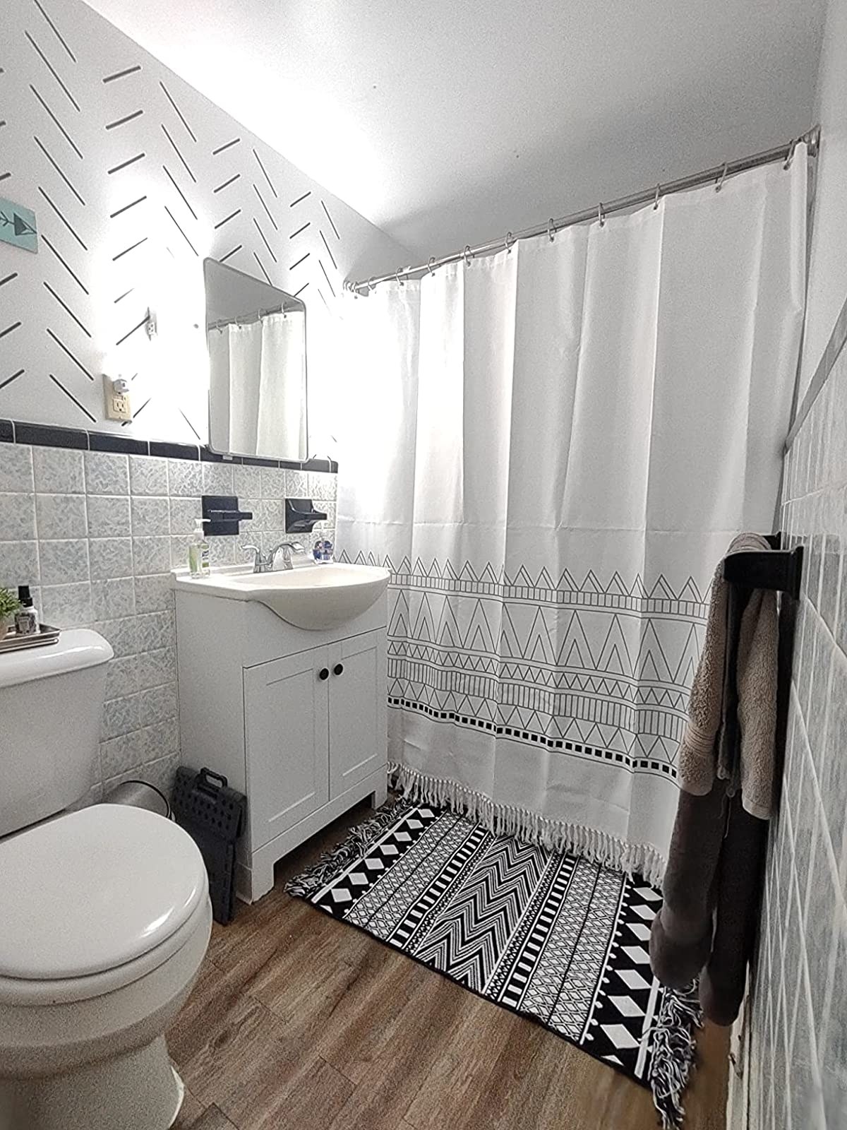 Reviewer&#x27;s photo of the shower curtain in the color White