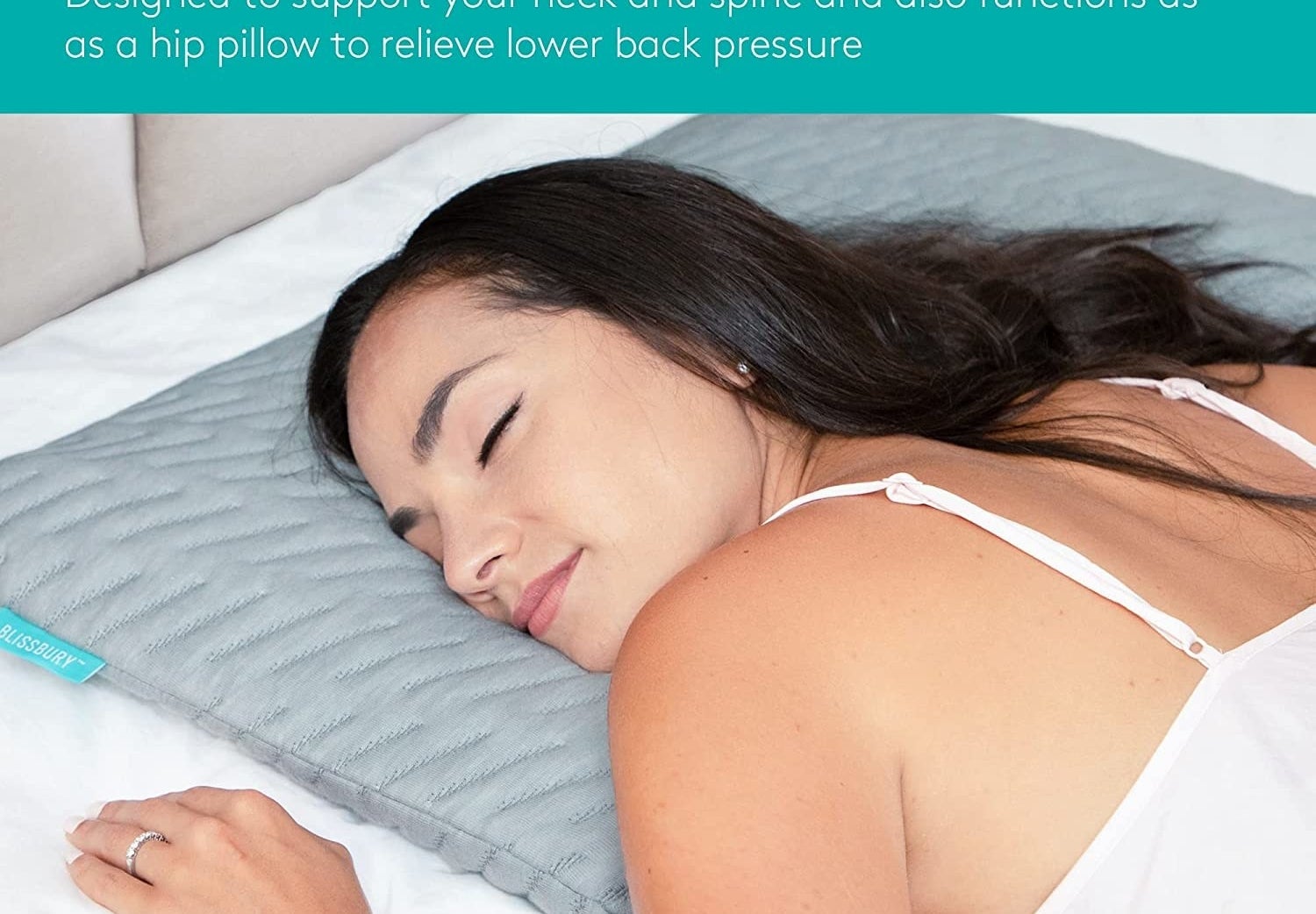 person laying on their stomach with their cheek on the pillow sleeping