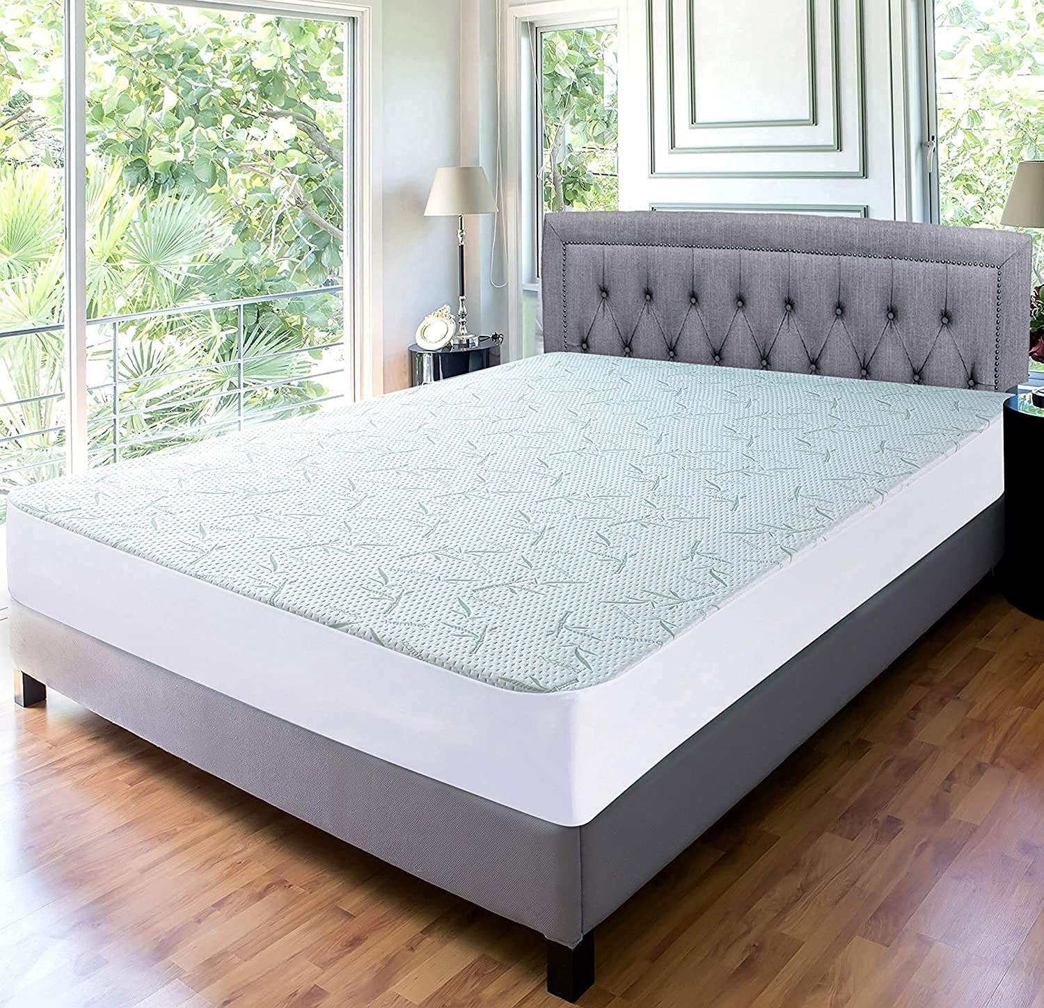the mattress protector on a mattress on a bed