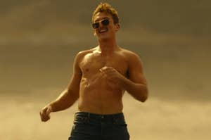 Miles Teller dancing on the beach as Rooster in Top Gun Maverick