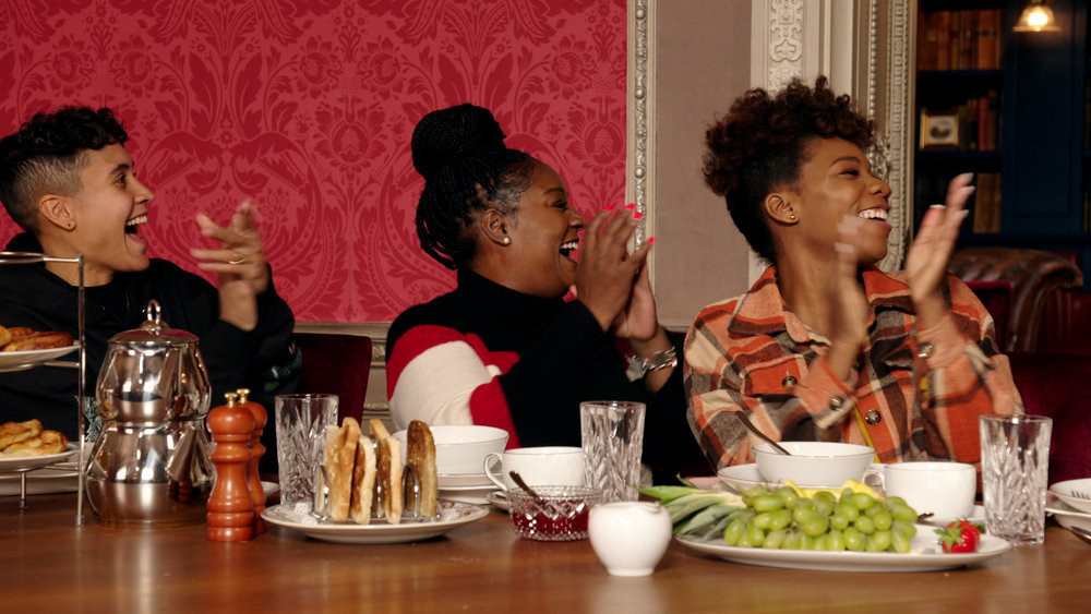 Andie, Cirie, and Shelbe sit at a breakfast table