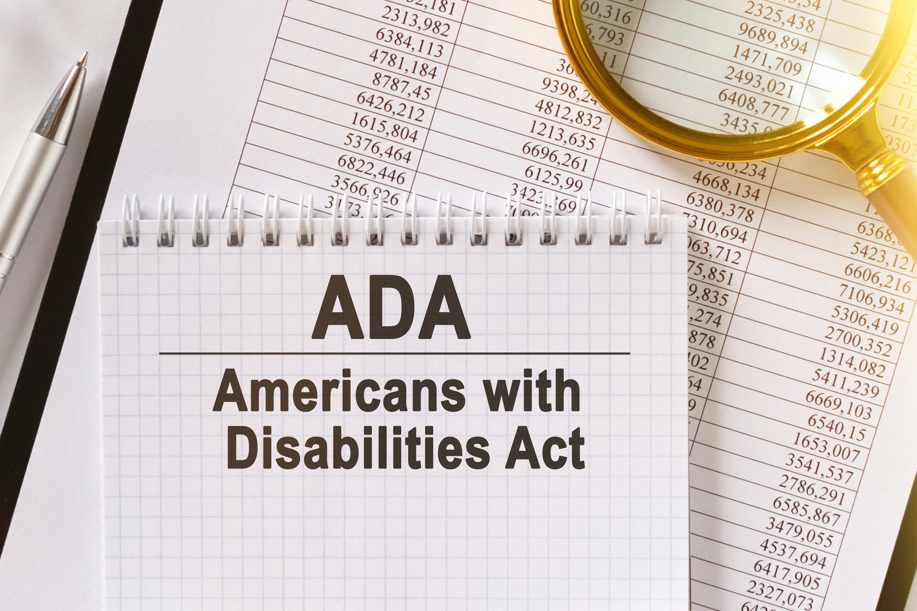 Notepad with &quot;Americans With Disabilities Act&quot; on it