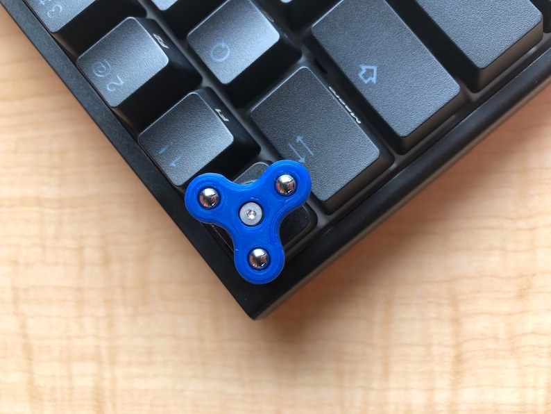 fidget spinner on keyboard