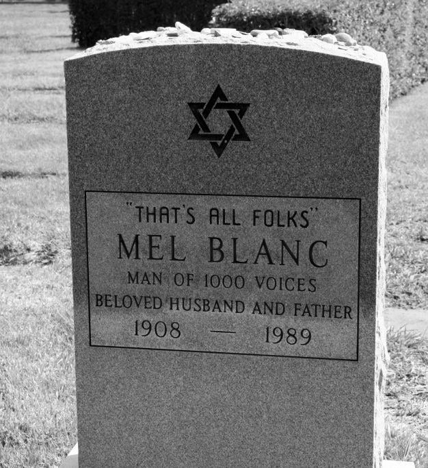 Grave of Blank&#x27;s tombstone which also features a star of david and says man of 1000 voices, beloved husband and father