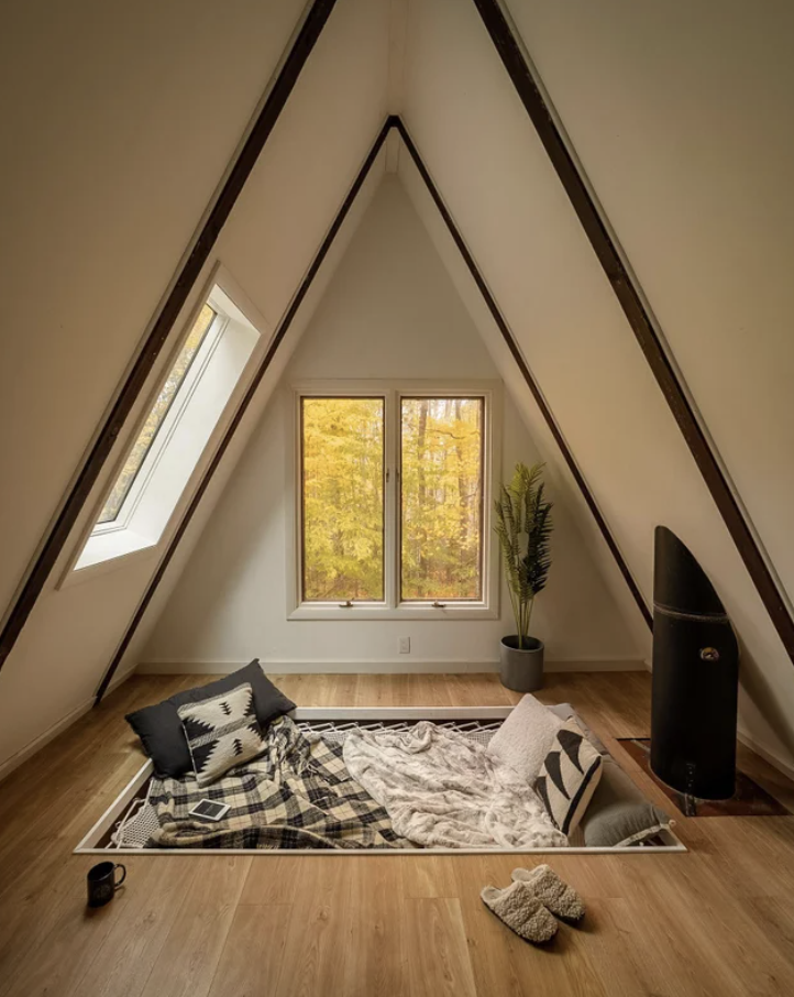 A hammock bed in the floor