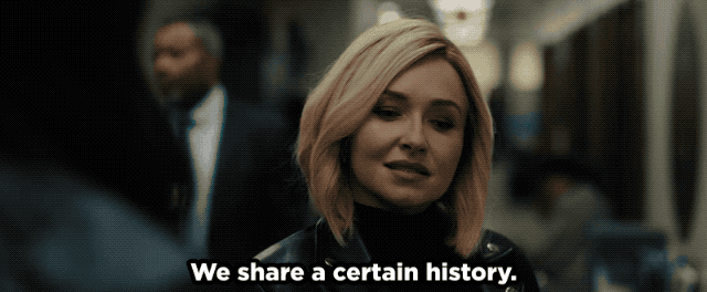 A woman tells a group of women "We share a certain history"