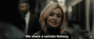 A woman tells a group of women &quot;We share a certain history&quot;