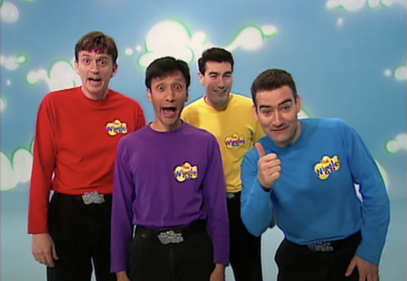 The OG Wiggles crew singing and one of them giving the thumbs up