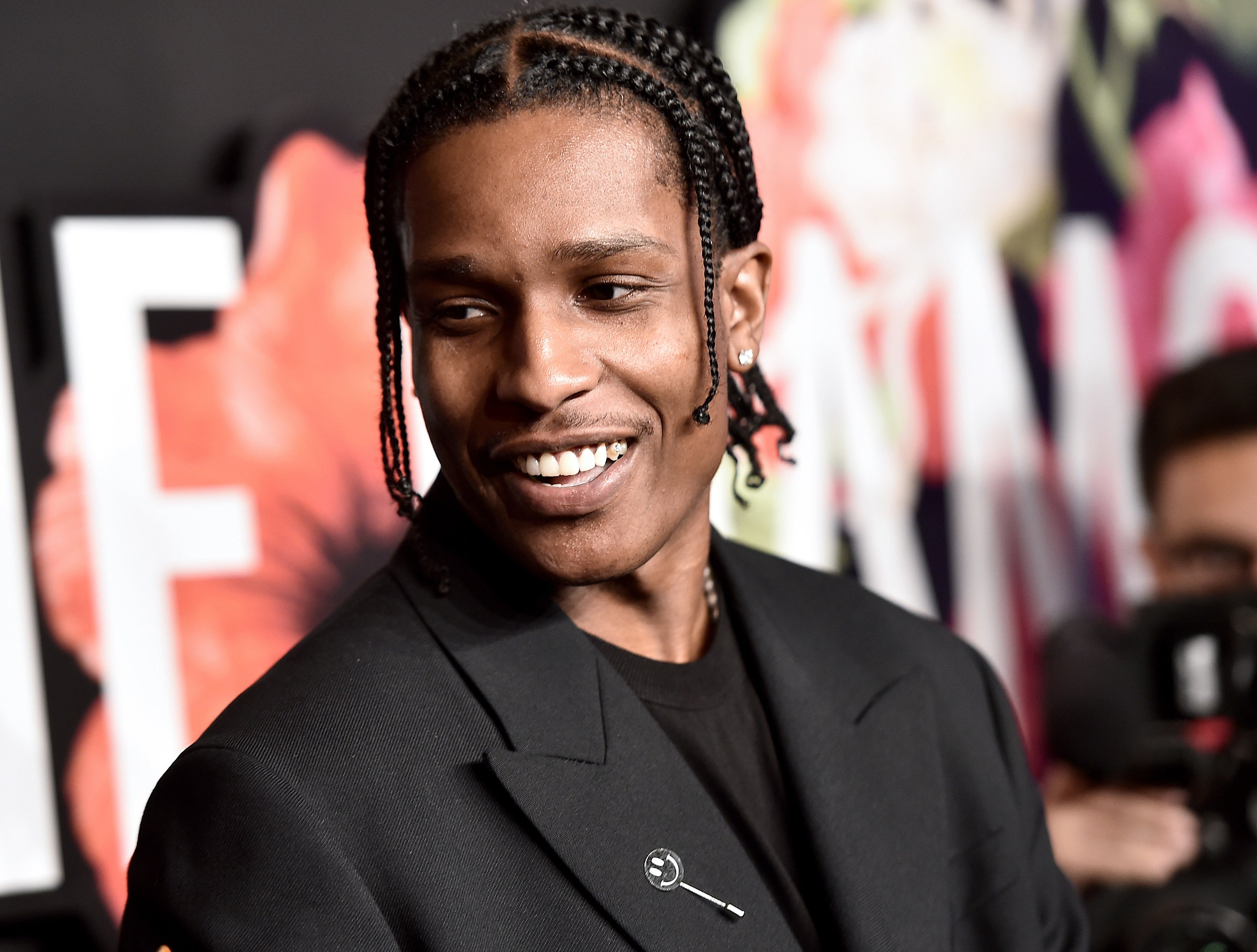 A close-up of A$AP smiling