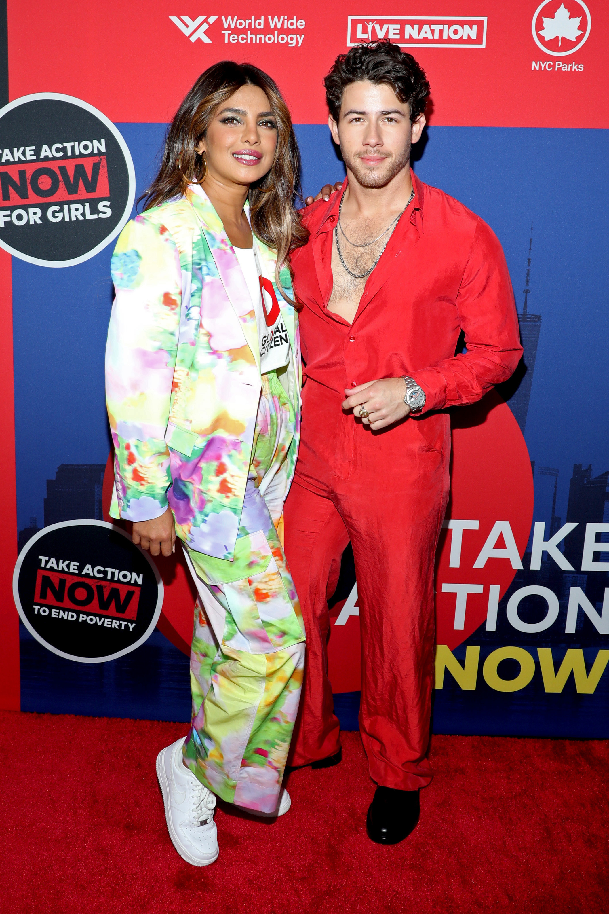 Priyanka and Nick pose together for a red carpet photo.
