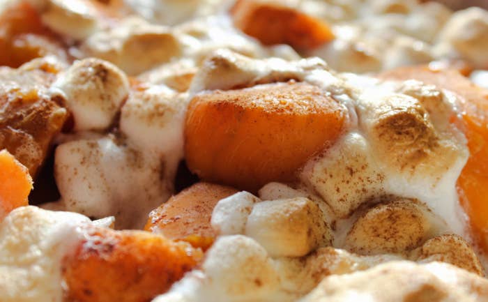 Close up of sweet potatoes with cinnamon and marshmallows