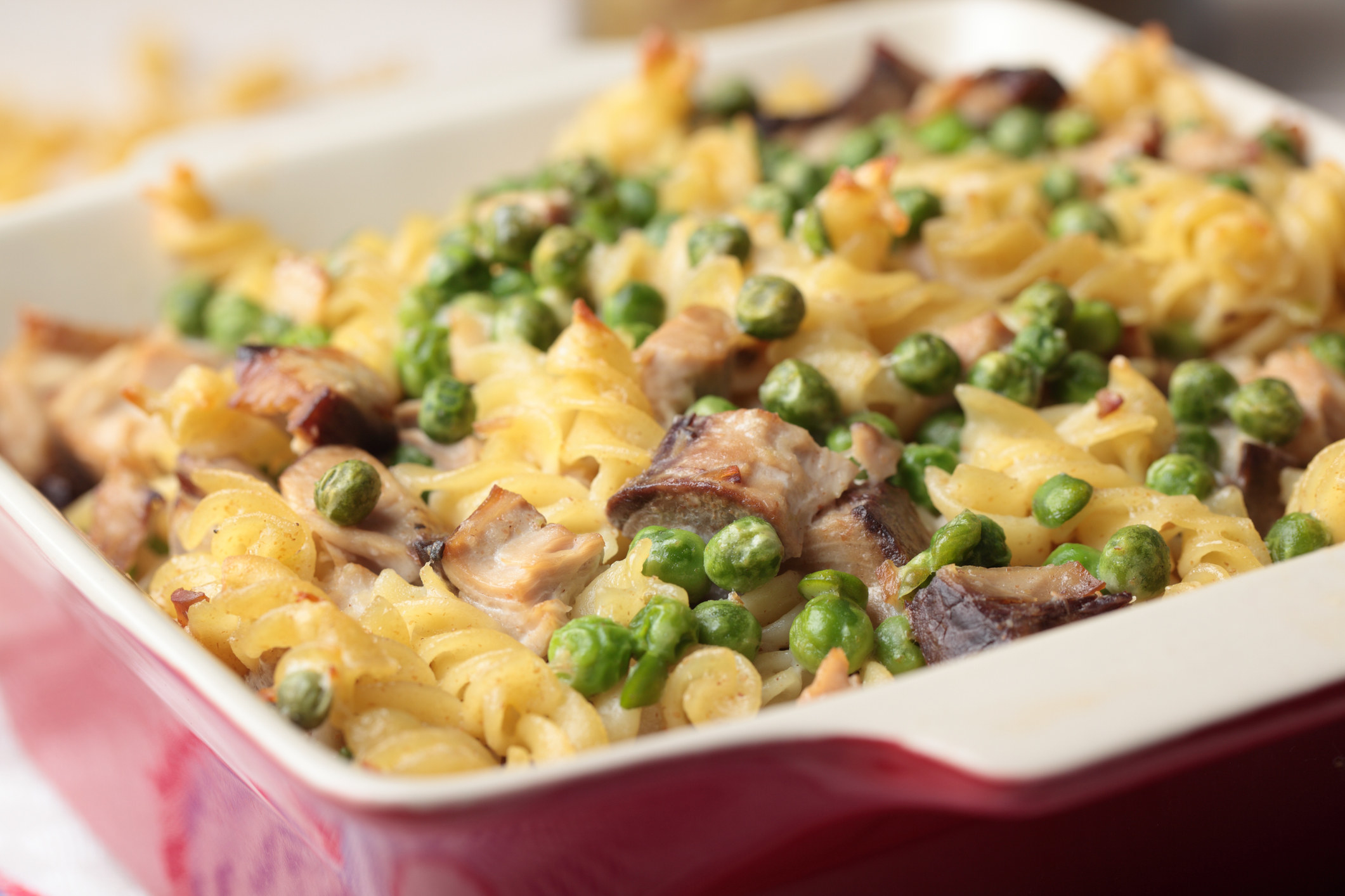 Tuna casserole with pasta and green peas.