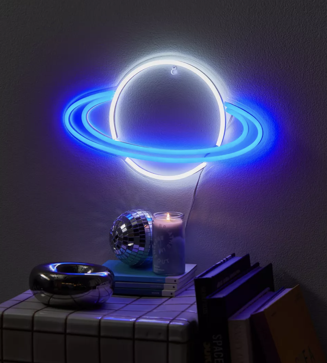 the Saturn light on a wall lit up