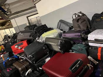 Piles of suitcases at an airport