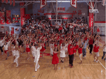 high school students dancing together in the gym