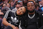 Yo Gotti and Angela Simmons appear at Memphis Grizzlies game