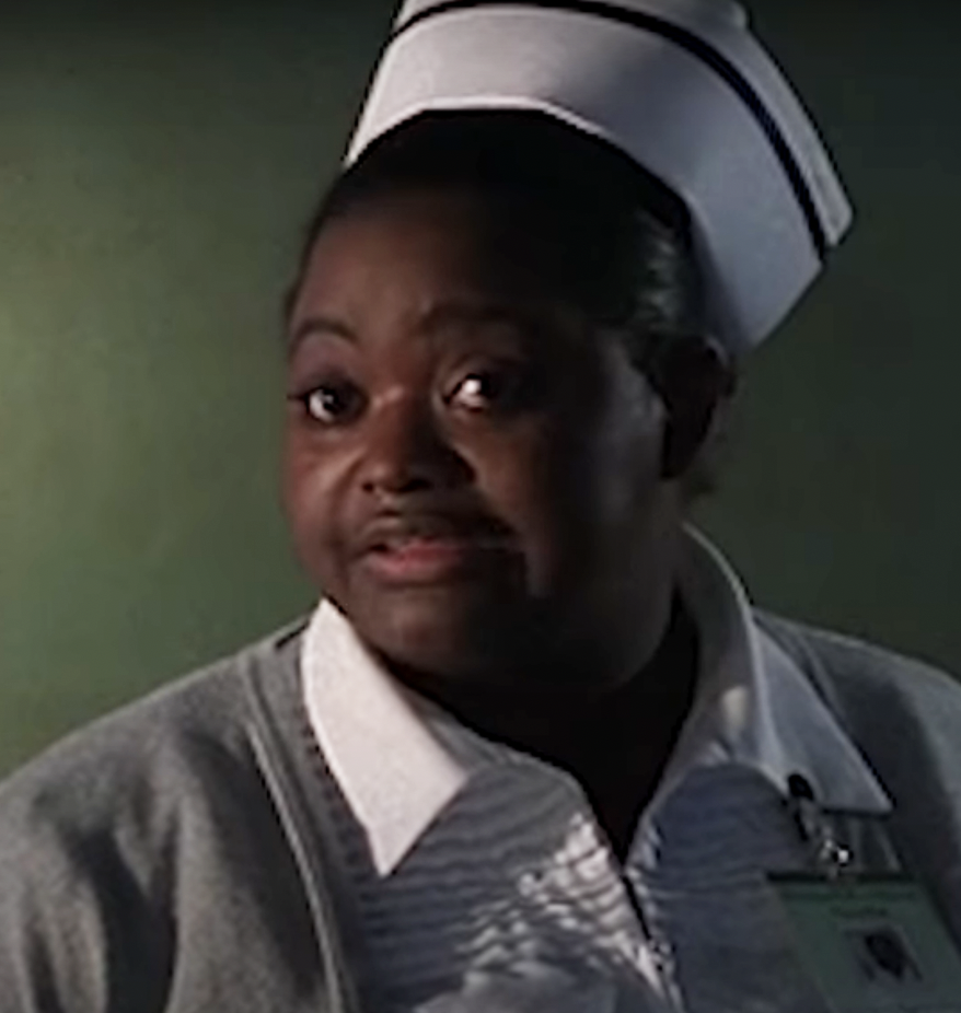 closeup of octavia in a nurse uniform