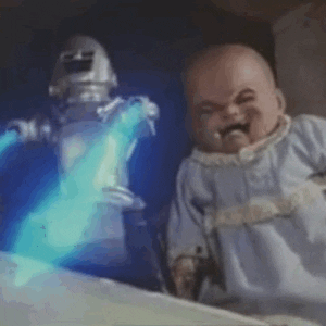 A baby doll laughs maniacally as a robot shoots lasers