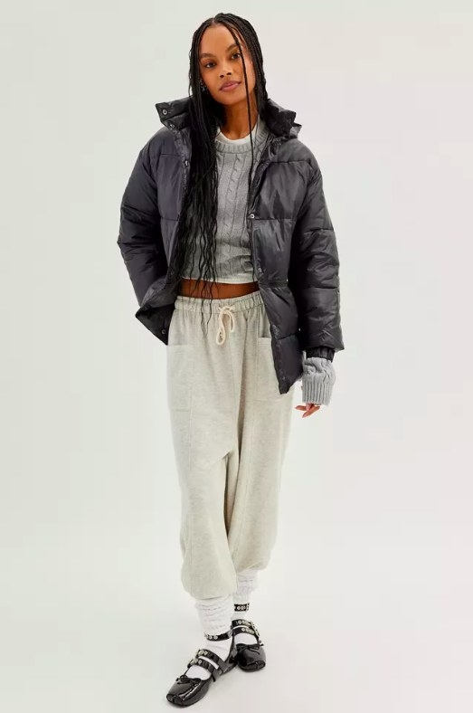 Model wearing black puffer jacket