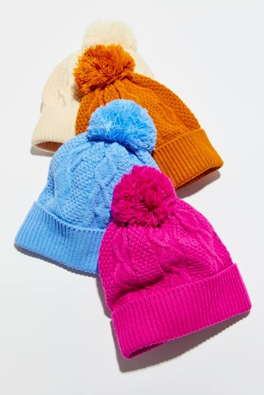 Four colorful beanies