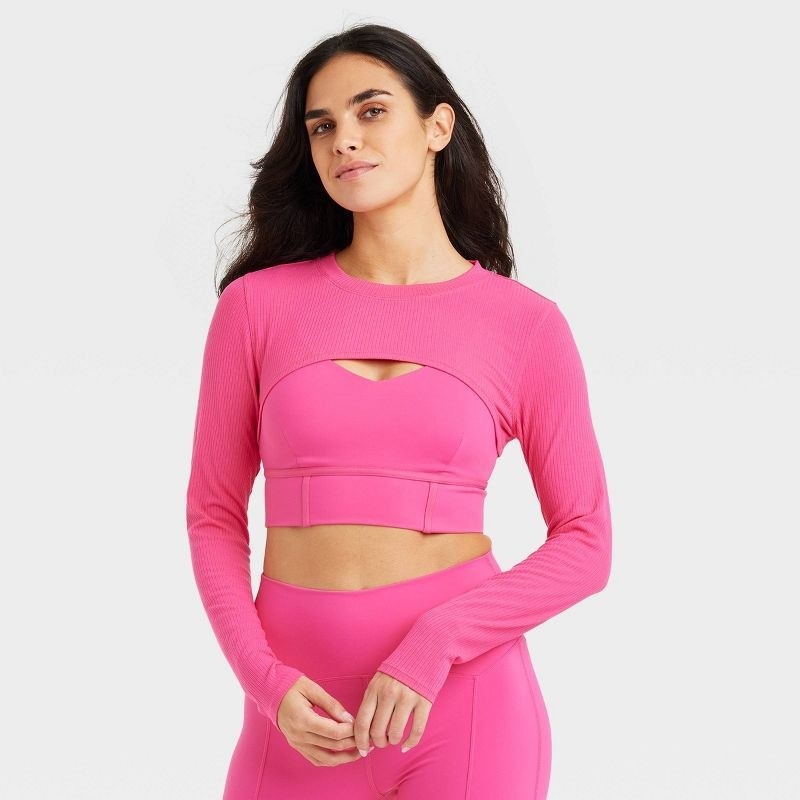 Model wearing pink outfit