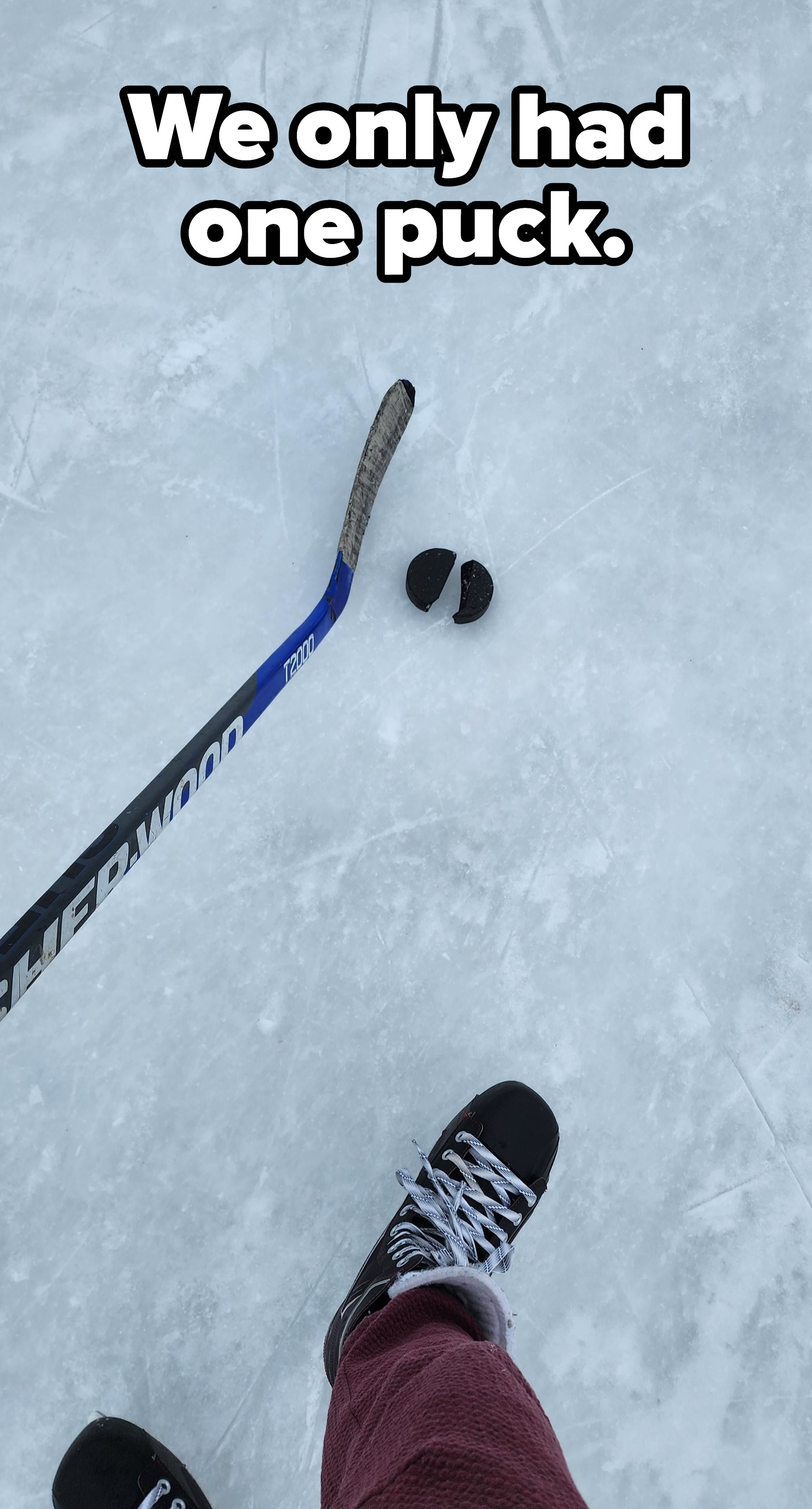 Broken hockey puck on ice
