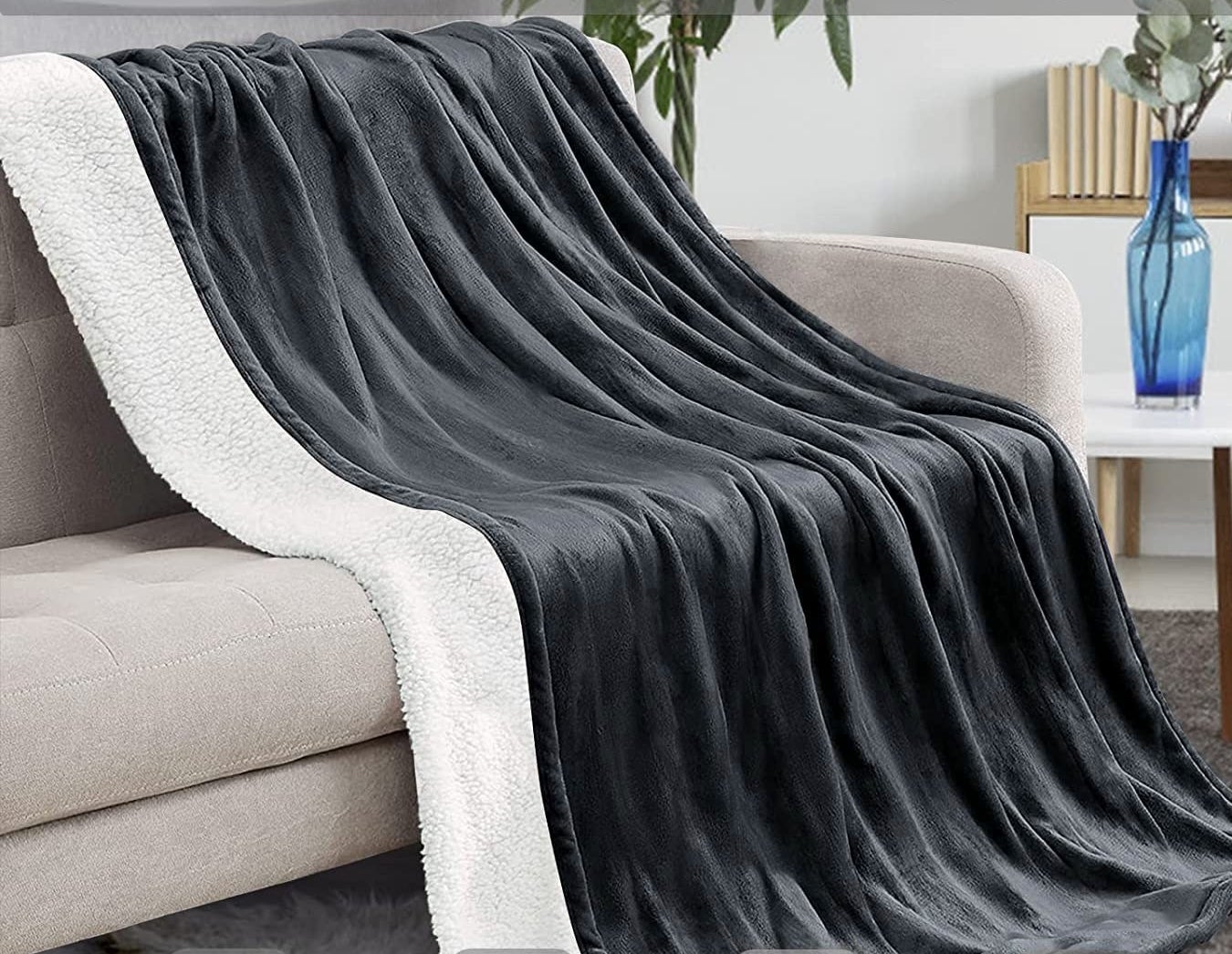 the throw blanket draped over a couch