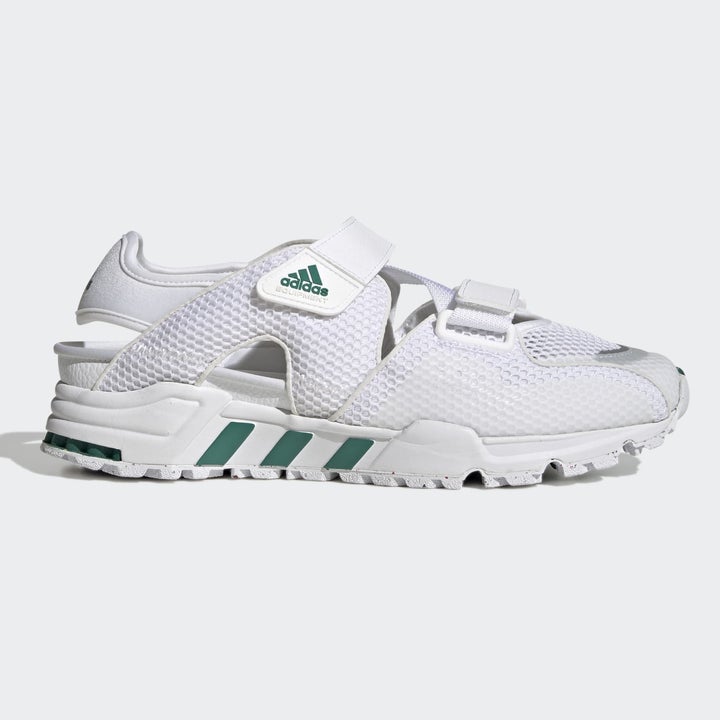 a sandal running shoe hybrid on a blank background