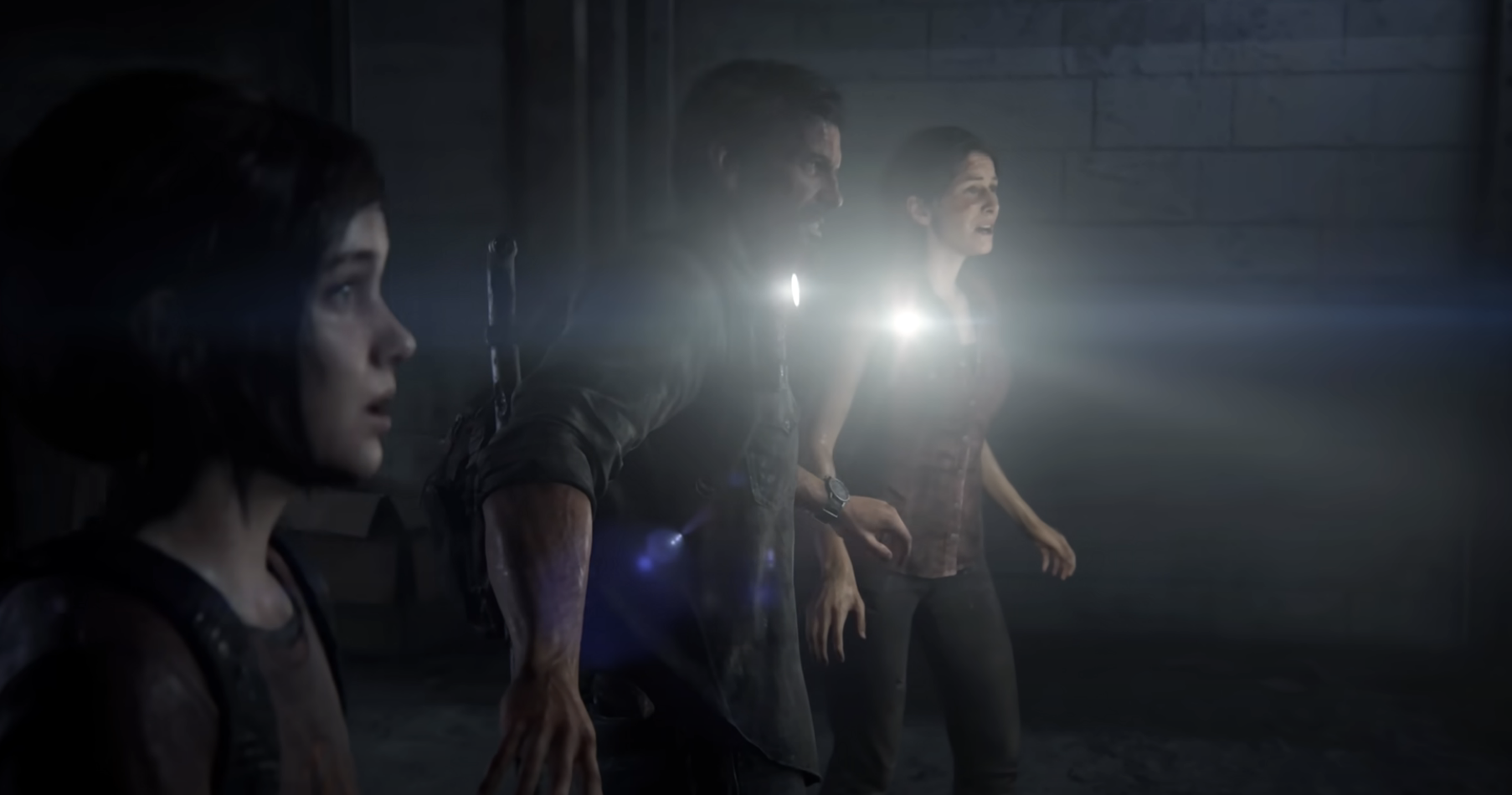A scene from the video game featuring three characters in a dark room