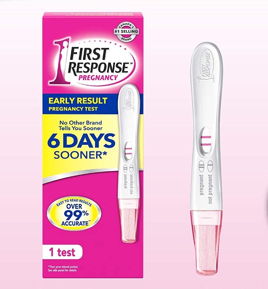 the pregnancy test against a plain background