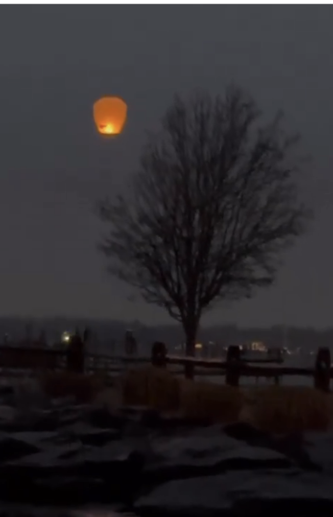 The lantern floating into the night sky