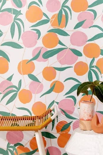 The peach printed wallpaper in a room