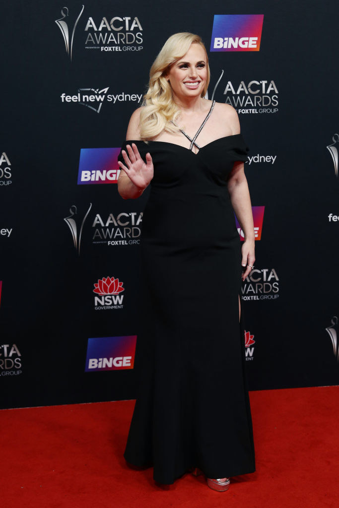 Rebel in an off-the-shoulder gown on the red carpet