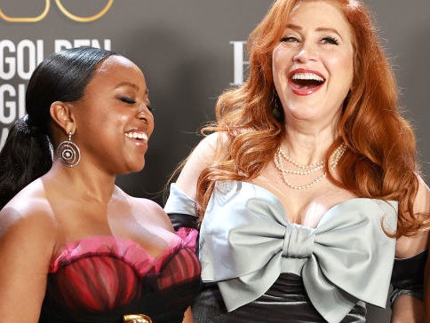 closeup of two women laughing