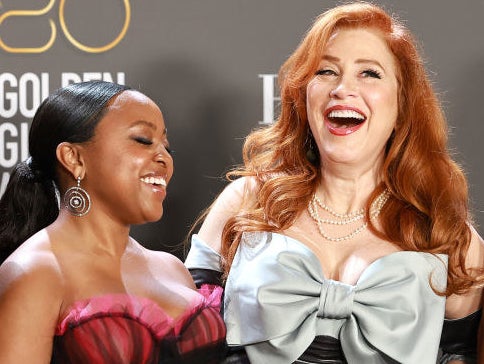 closeup of two women laughing
