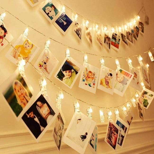 String lights with Polaroid pics clipped onto them