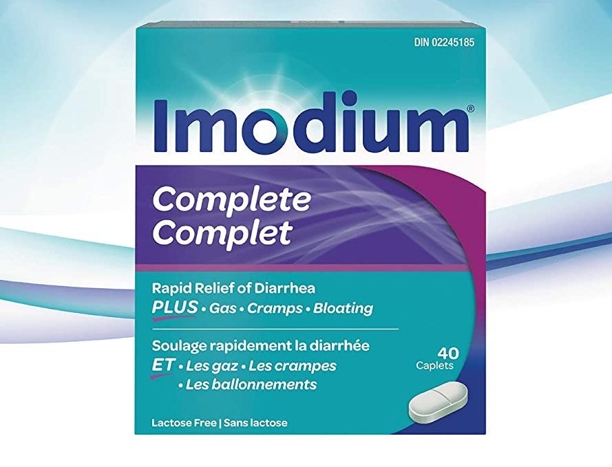 the pack of imodium against a graphic background