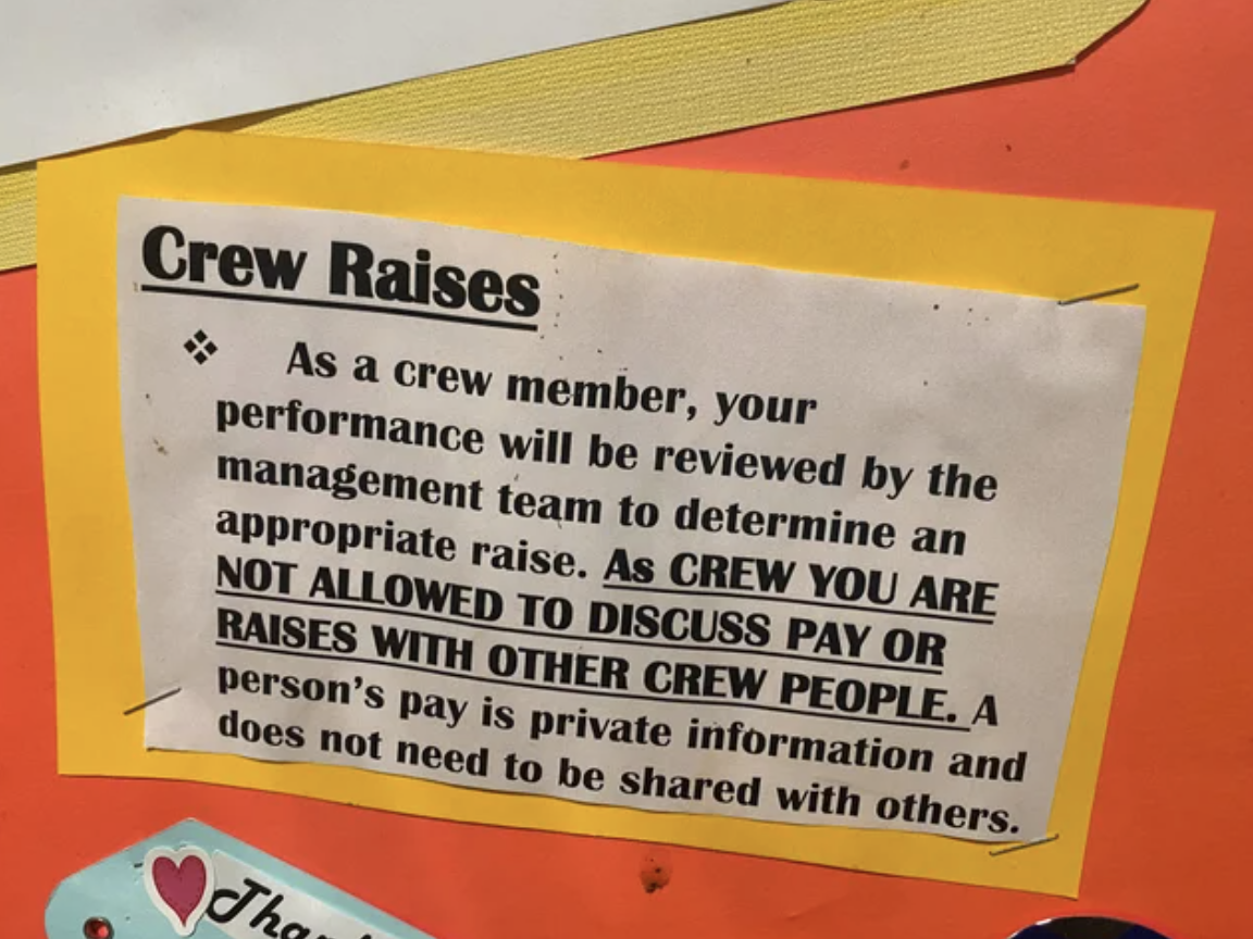 A  notice that crew members are not allowed to discuss their pay with one another