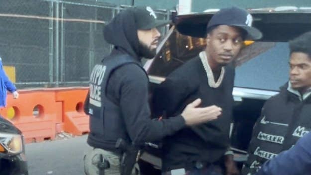 Lil Tjay's “Clutchin My Strap” video includes footage from the artist’s Monday arrest on a gun possession charge in the Bronx. He was released yesterday.