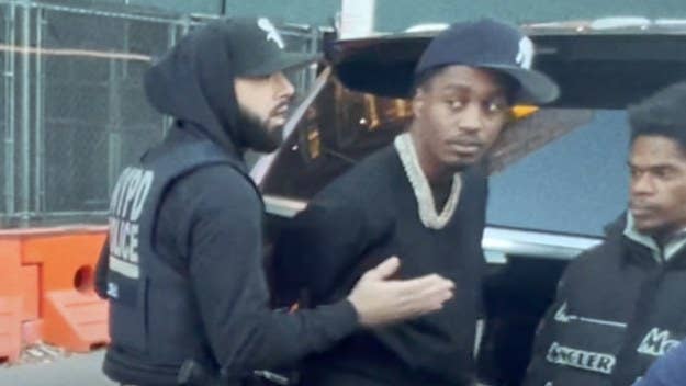 Lil Tjay's “Clutchin My Strap” video includes footage from the artist’s Monday arrest on a gun possession charge in the Bronx. He was released yesterday.