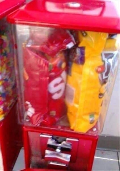 Large bags of candy stuffed into the dispenser instead of loose candies