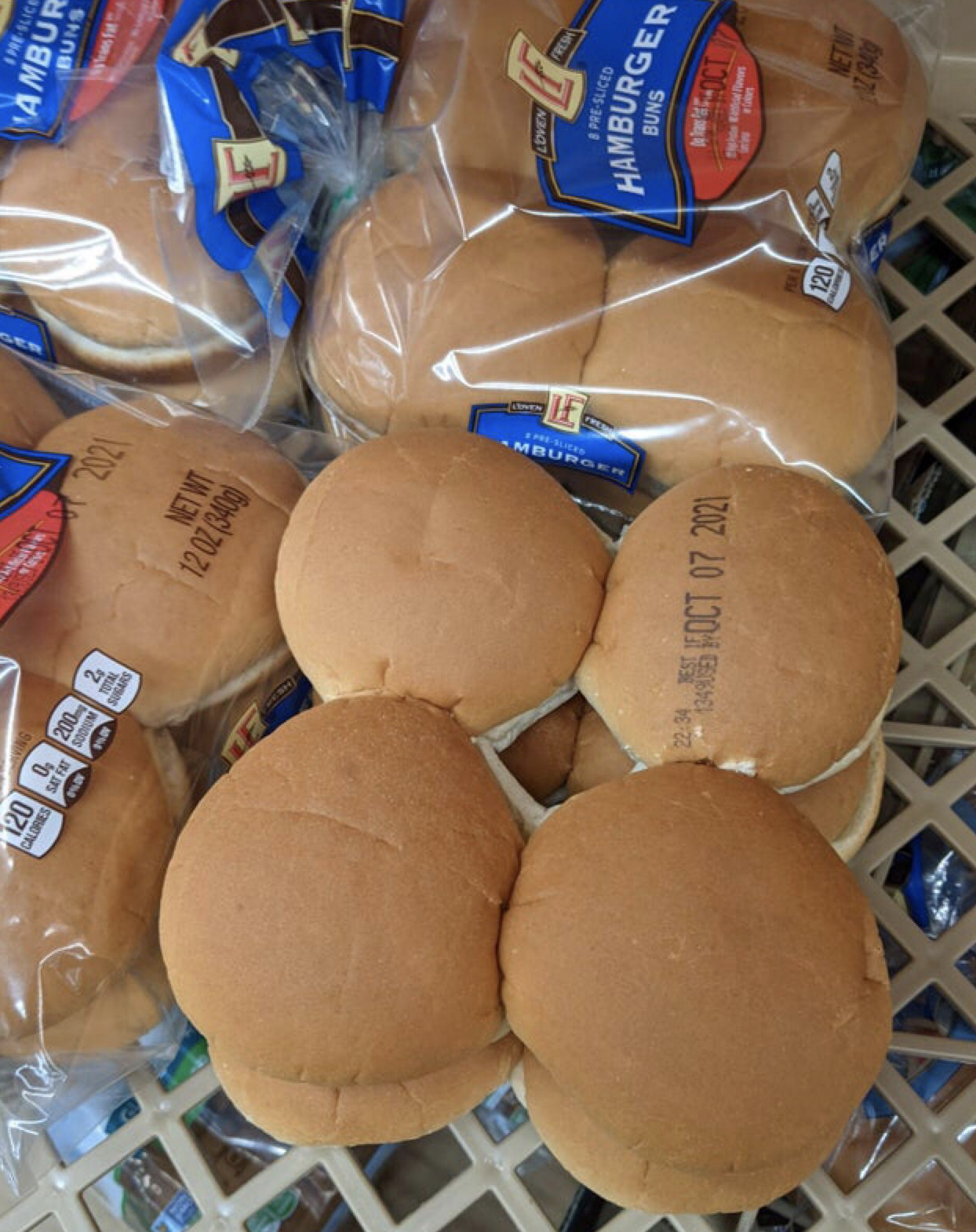 Hamburger buns with expiration dates on the actual bread