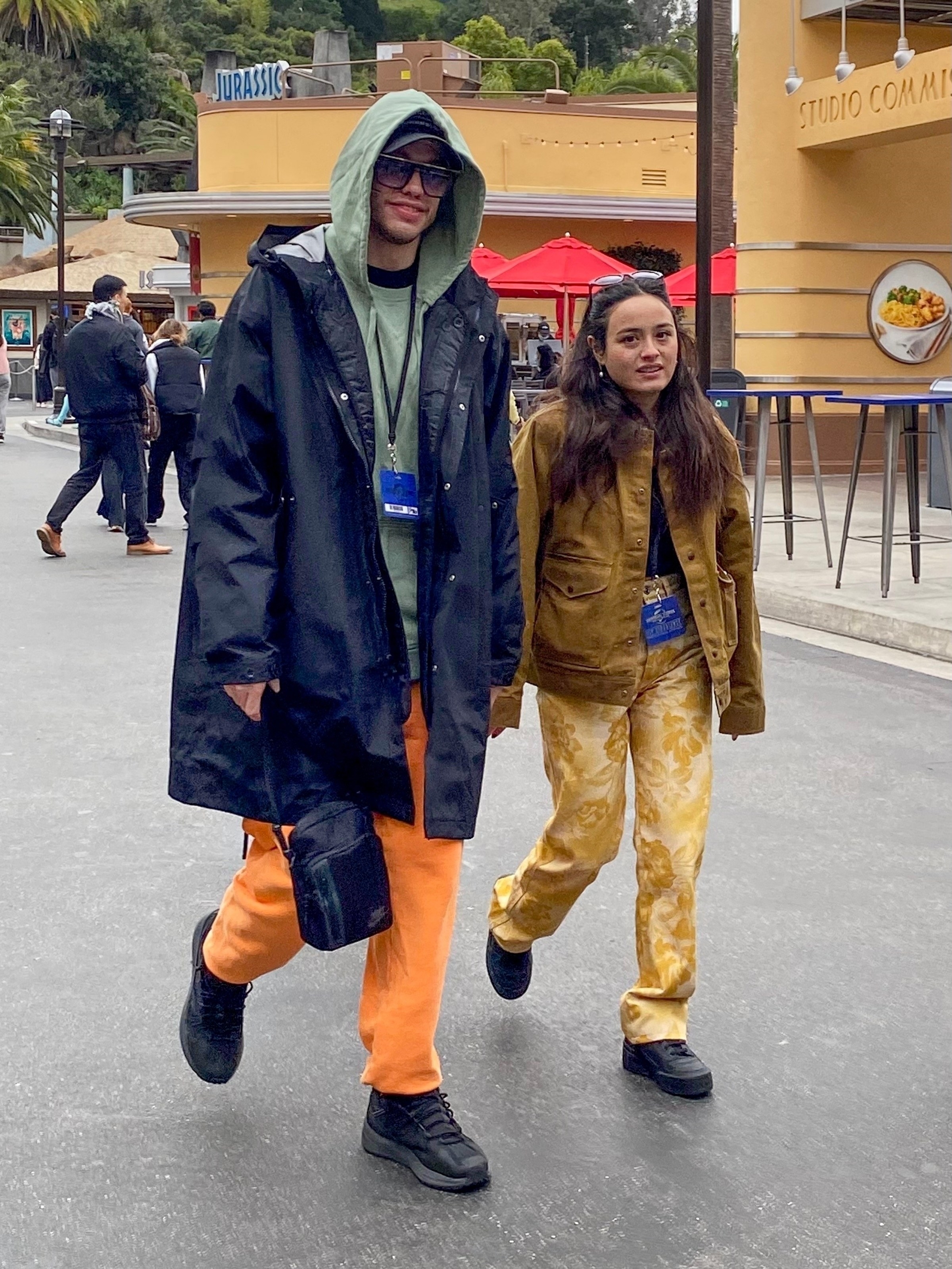the couple walking at universal studios
