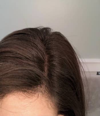 The same reviewer showing their hair after using the spray